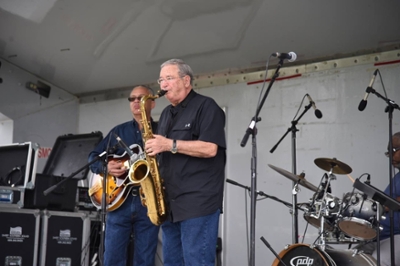 Dr. Jimmy Simmons plays his sax Day in the Park