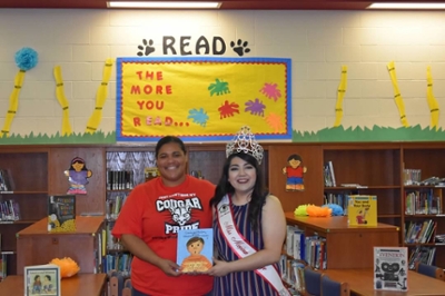 2018 Southeast Texas Hispanic Society Queen reads to NEST Campus Students.