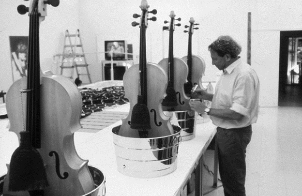 Rauschenberg signing cello