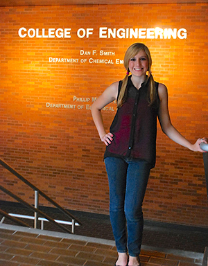 Tyler Doiron stands in engineering building