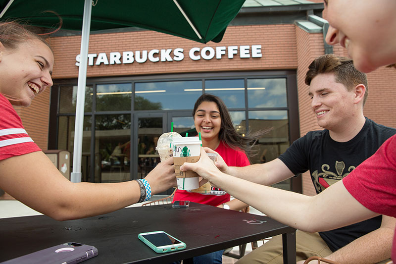 Students enjoying Starbucks at Gray Library